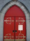 Magna Carta posted on red church doors