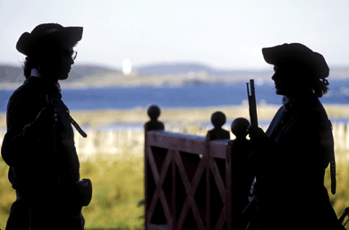 Two American soldiers prepare for the Revolution