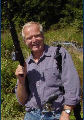 An Englishman in America, out in a field for target practice with guns  