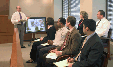 Modern jury looking at video of crime scene
