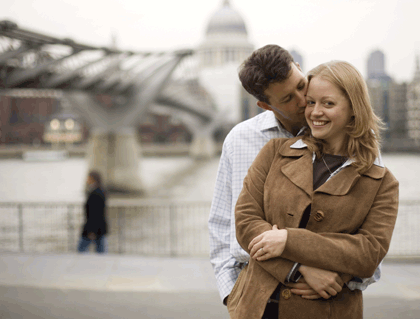Loving couple in front of St Paul's Cathedral, London