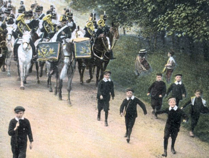 19th century schoolboys larking with King's Hussars