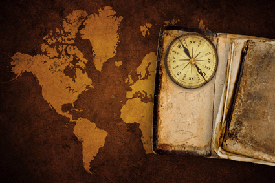 Old map of the world with compass
