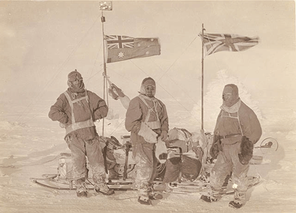 Mawson and a sledging party in Antarctica, British and Australian flags flying