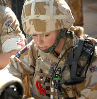 A British nurse in Basra tends the wounded