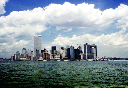 World Trade Center towers in 2001, shining across the water before they were attacked