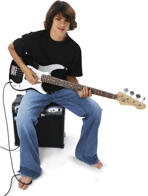 Boy playing electric guitar with electric cord draped over bare foot