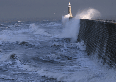 Tynemouth Lighthouse resists crashing waves