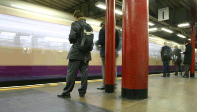 London subway streaming past underground platform