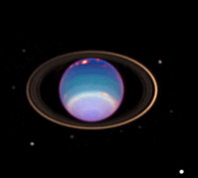 Uranus with its rings and some of its satellites