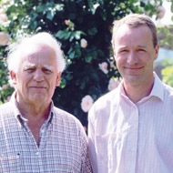 David Austin and his son David Austin squinting in the sun