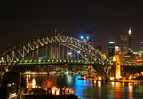 Sydney Bridge glittering at night