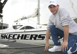 Boy on deck of sailing boat