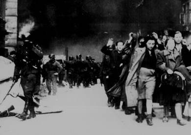 Nazis destroy Warsaw Ghetto, and send Jewish people to their deaths